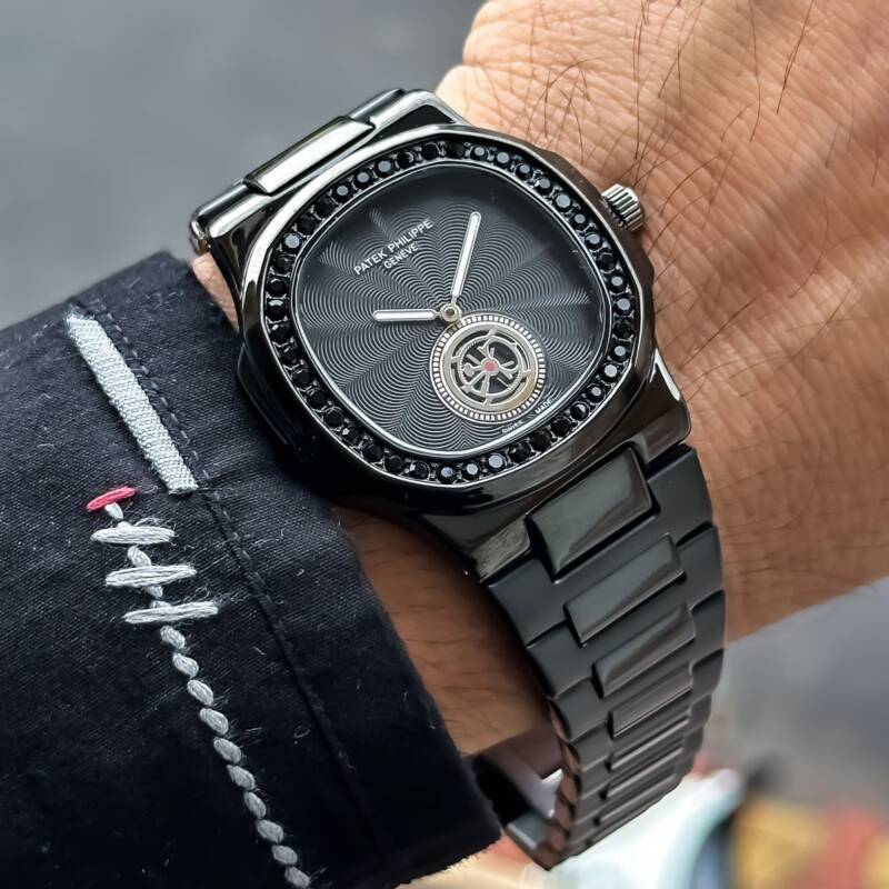Patek Phillipe Nautilus Full Black 1 https://spacetimewatch.com/shop/patek-phillipe-nautilus-full-black/