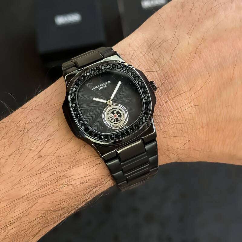 Patek Phillipe Nautilus Full Black 3 https://spacetimewatch.com/shop/patek-phillipe-nautilus-full-black/