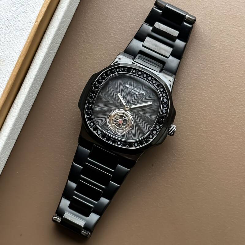 Patek Phillipe Nautilus Full Black 5 https://spacetimewatch.com/shop/patek-phillipe-nautilus-full-black/