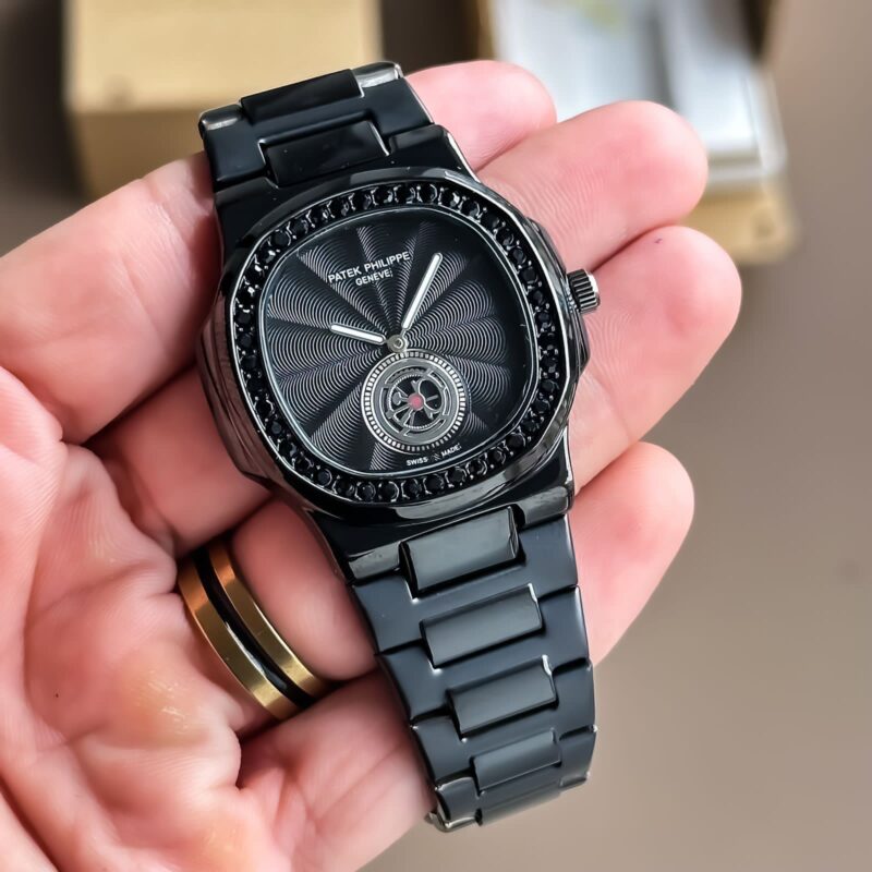 Patek Phillipe Nautilus Full Black 6 https://spacetimewatch.com/shop/patek-phillipe-nautilus-full-black/