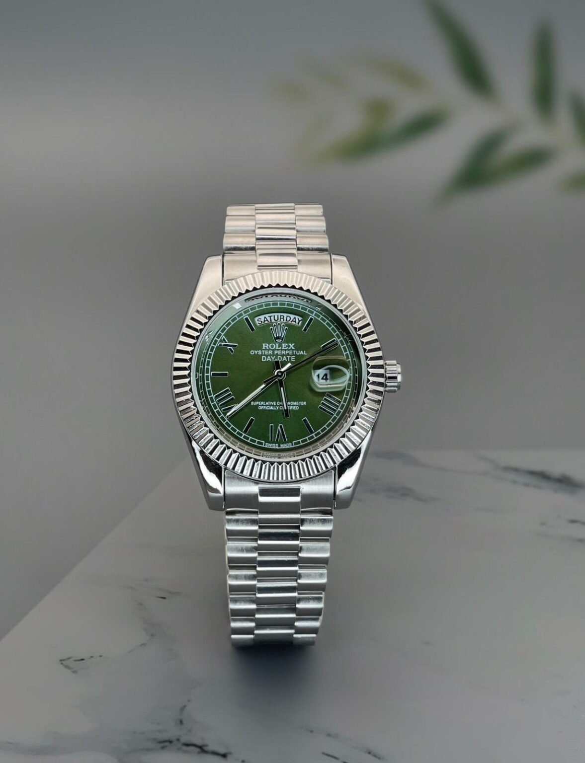 IMG 20240921 WA0013 https://spacetimewatch.com/shop/rolex-day-date-green-dial-2/