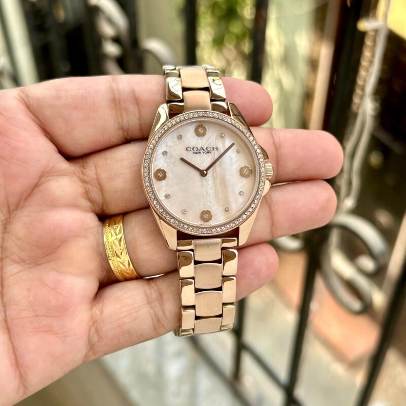 IMG 20241118 WA0021 scaled https://spacetimewatch.com/shop/coach-mother-pearl-analog/