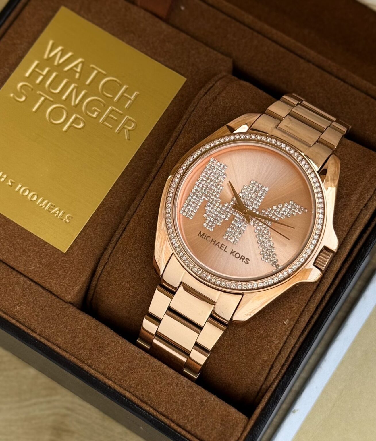 IMG 20241206 WA0017 https://spacetimewatch.com/shop/michael-kors-gleaming-stone-set-bezel/