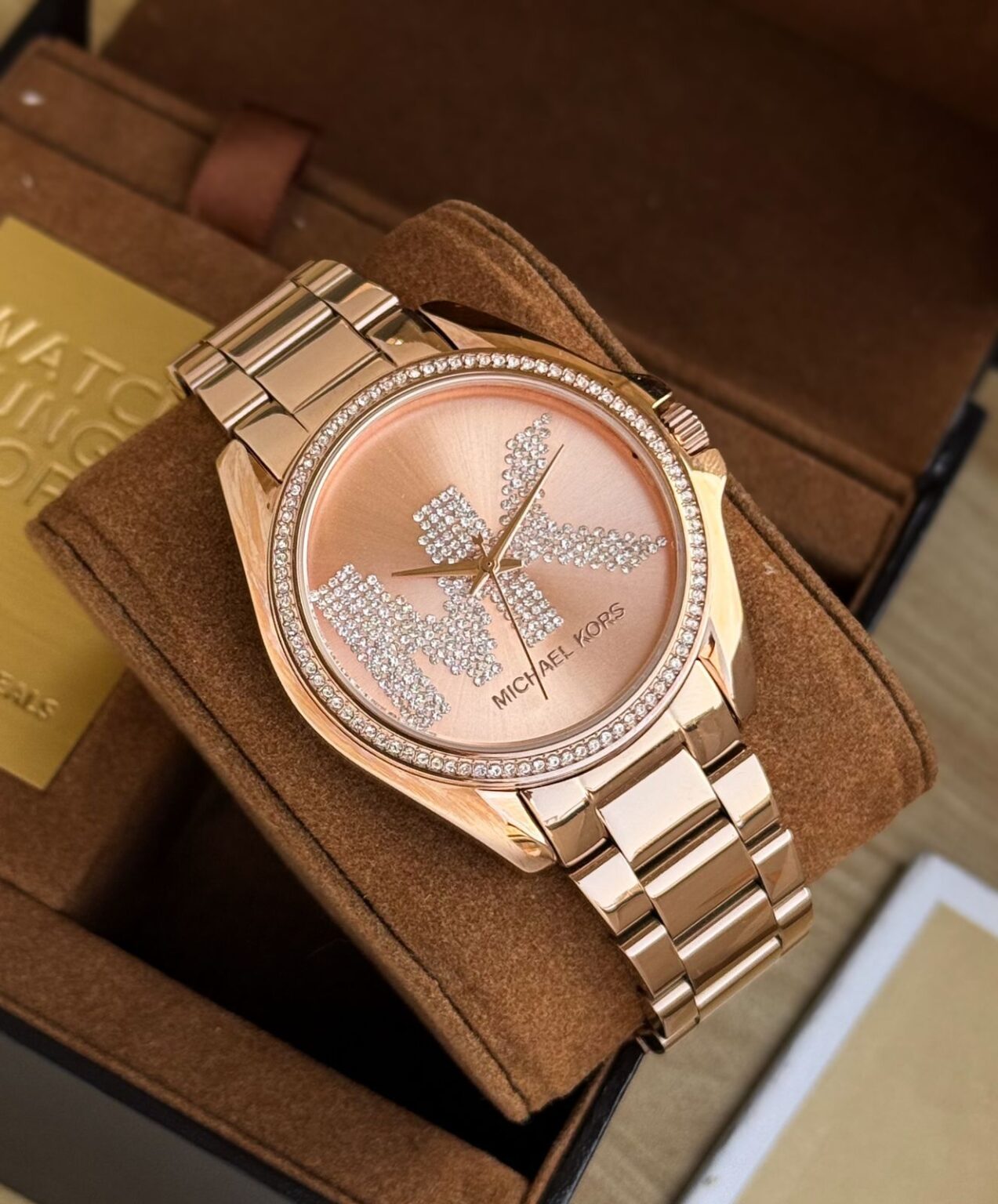 IMG 20241206 WA0021 https://spacetimewatch.com/shop/michael-kors-gleaming-stone-set-bezel/