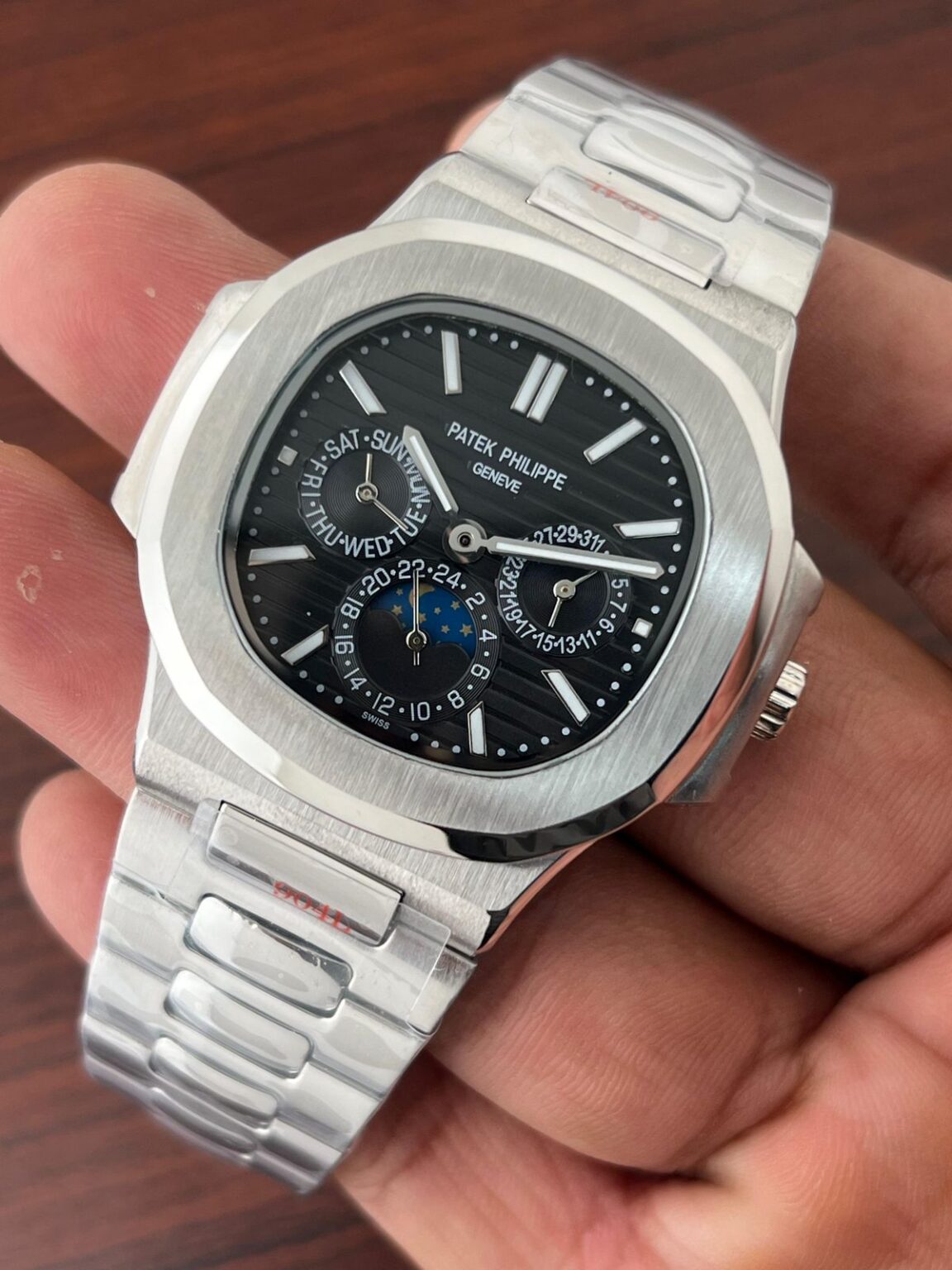 IMG 20241225 WA0008 https://spacetimewatch.com/shop/patek-philippe-nautilus-automatic/