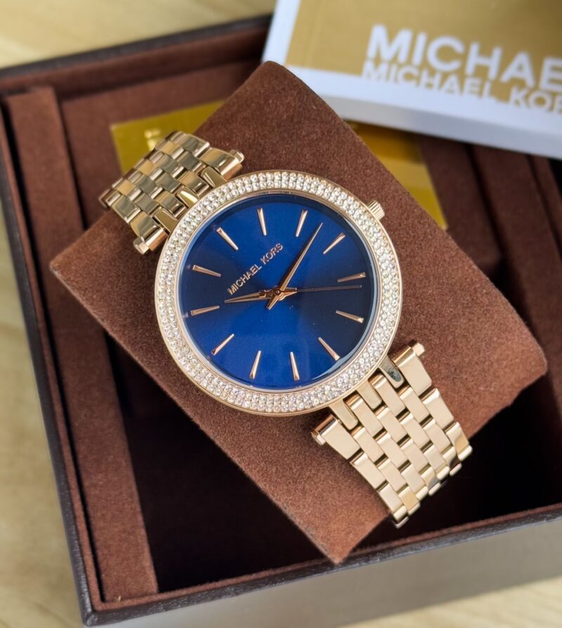IMG 20250205 WA0033 https://spacetimewatch.com/shop/michael-kors-mother-of-pearl-dial/
