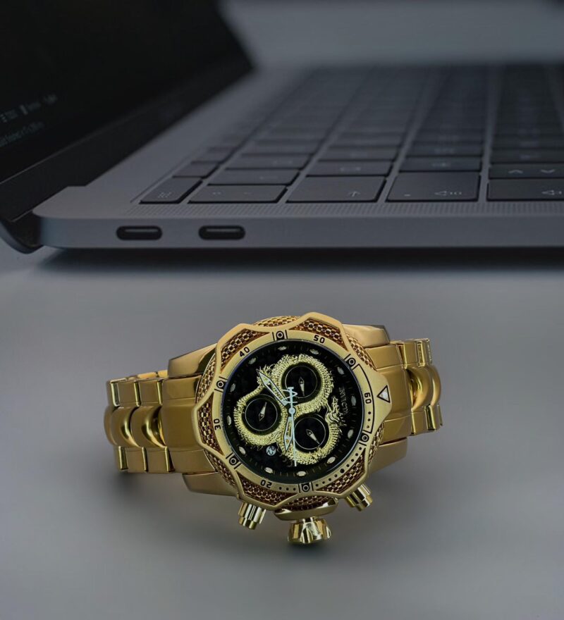 WhatsApp Image 2025 06 11 at 2.23.39 AM https://spacetimewatch.com/shop/brand-invicta-model-venom-quality-7a-gender-mens-band-golden-dial-black/
